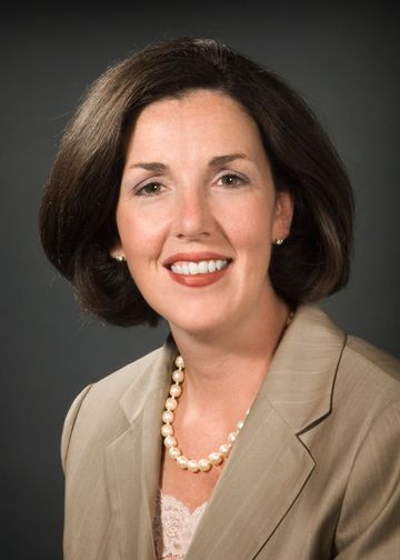 Kerri Scanlon, RN, wearing a brown jacket